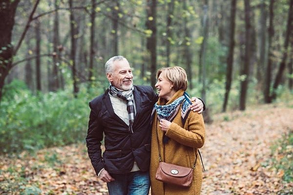 Happy Senior Couple in Woods