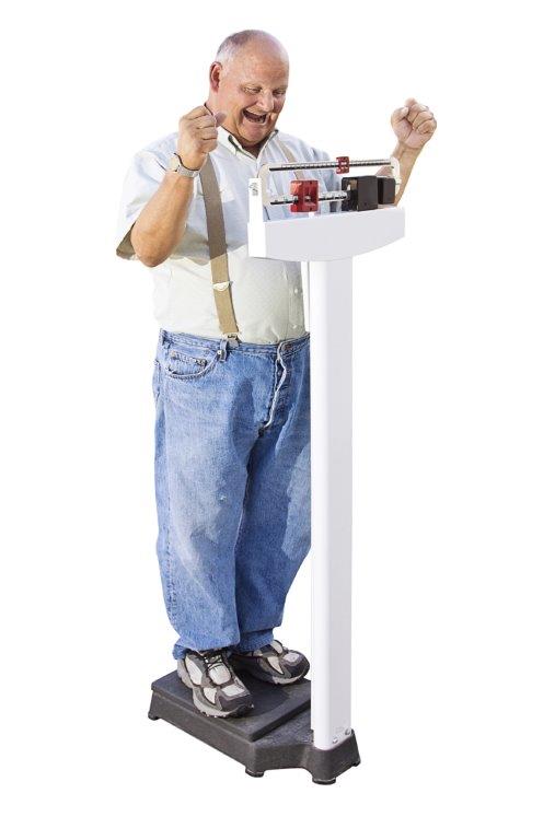 Man Excited Losing Weighton Scale