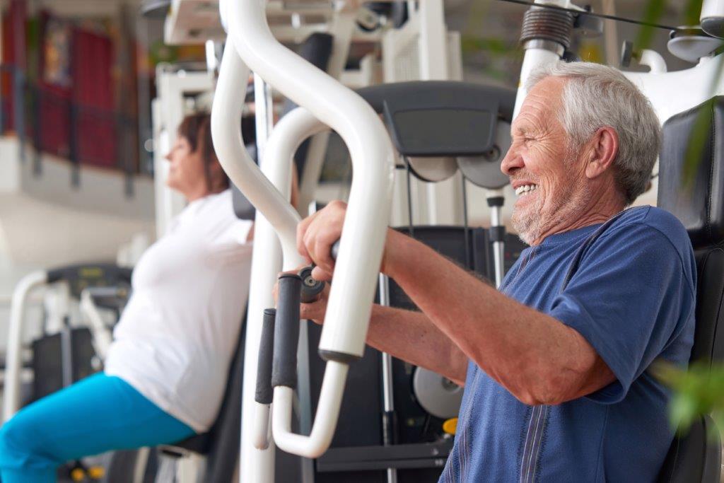 Senior Couple Chest Shoulder Machines