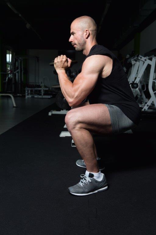 Single Dumbell Quad Squats